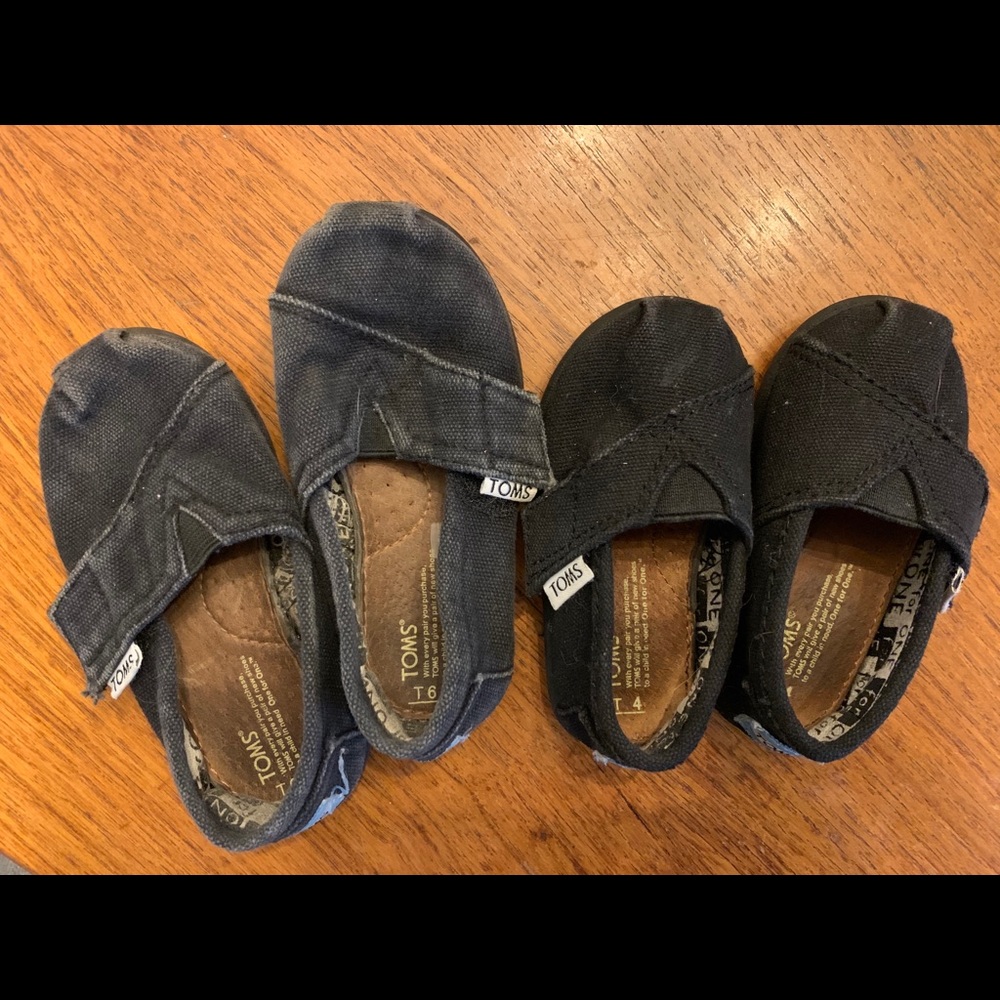 2 pairs of black Toms